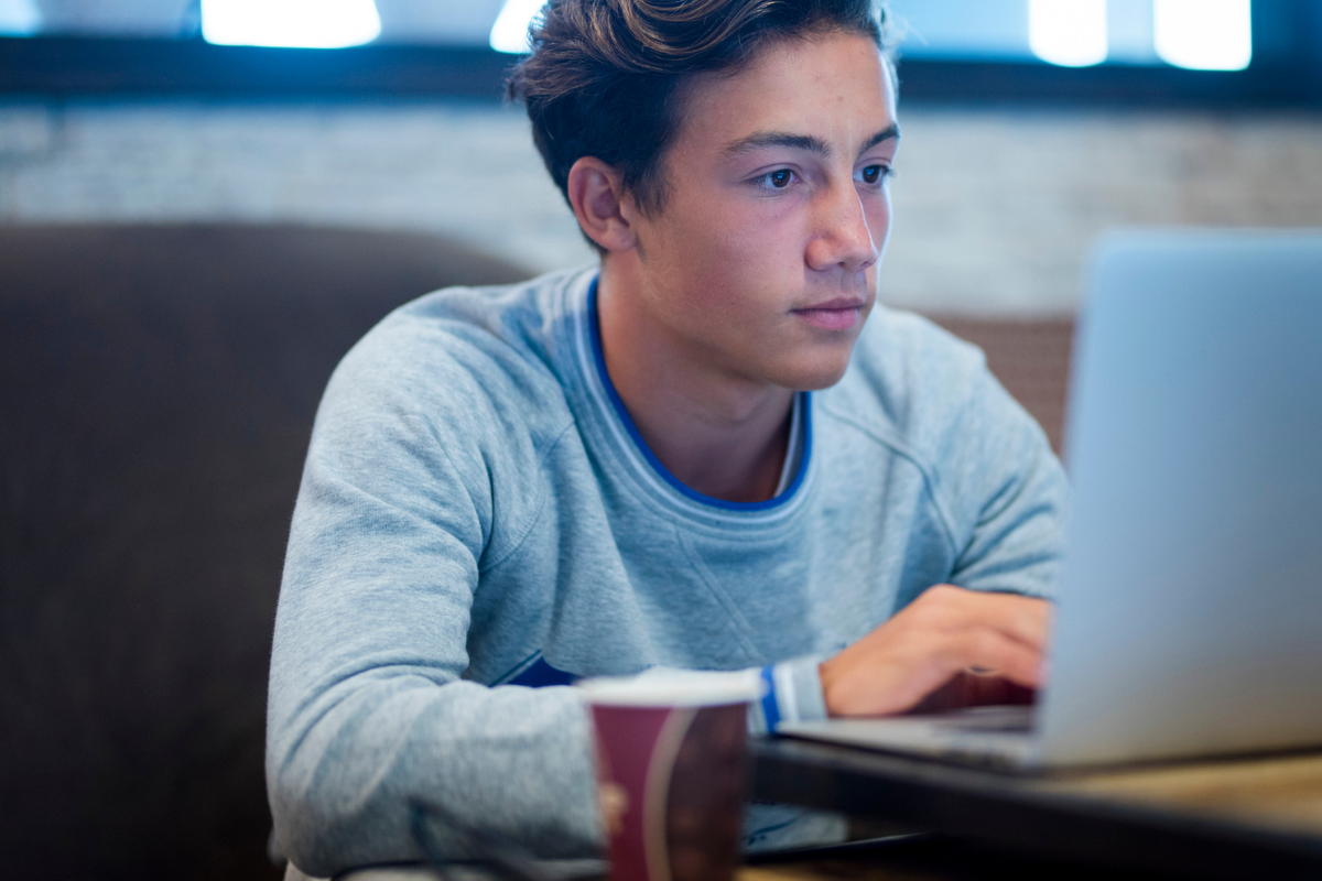 Teen on his computer
